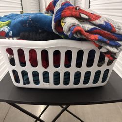 Basket of Blankets, scarves and clothes 