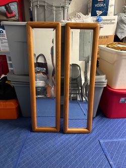 Twin wooden mirrors
