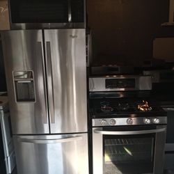 30 inch water and ice refrigerator combo and 30 inch gas stove