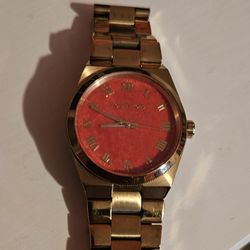 Micheal Kors Gold Red Face