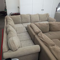Beige tan sectional couch
