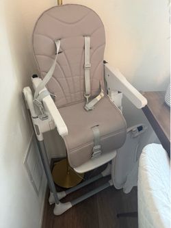 Baby high chair. Great condition. Leather cushion. Barely used. Selling for $30