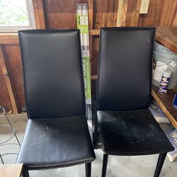 Two Black Leather Chairs