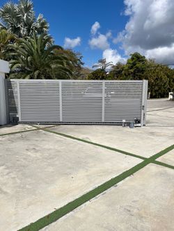 Electric gate noisy or moving uneven? Chain, motor, sensors, and full gate issues