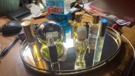 Seven Bottles Of Perfume And Mirror Tray