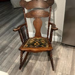 Antique saddleback spindle Oak rocking chair