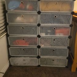 Plastic storage organizer with decorative pattern.10-Drawer Storage Organizer