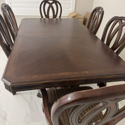 Dining Table and chairs  (PRICE  IS FIRM)