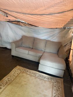 Grey couch with reversible chaise and pullout bed, good condition, clean. We sell the delivery $40 local