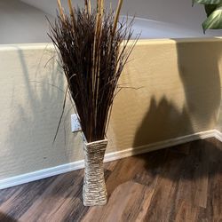 Dried Plant Leaves And Woven Basket