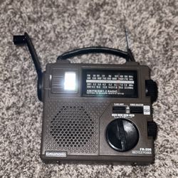 Grundig Hand Crank Emergency Radio W/ Flashlight
