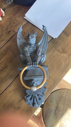 Vintage gargoyle door knocker animated with sound