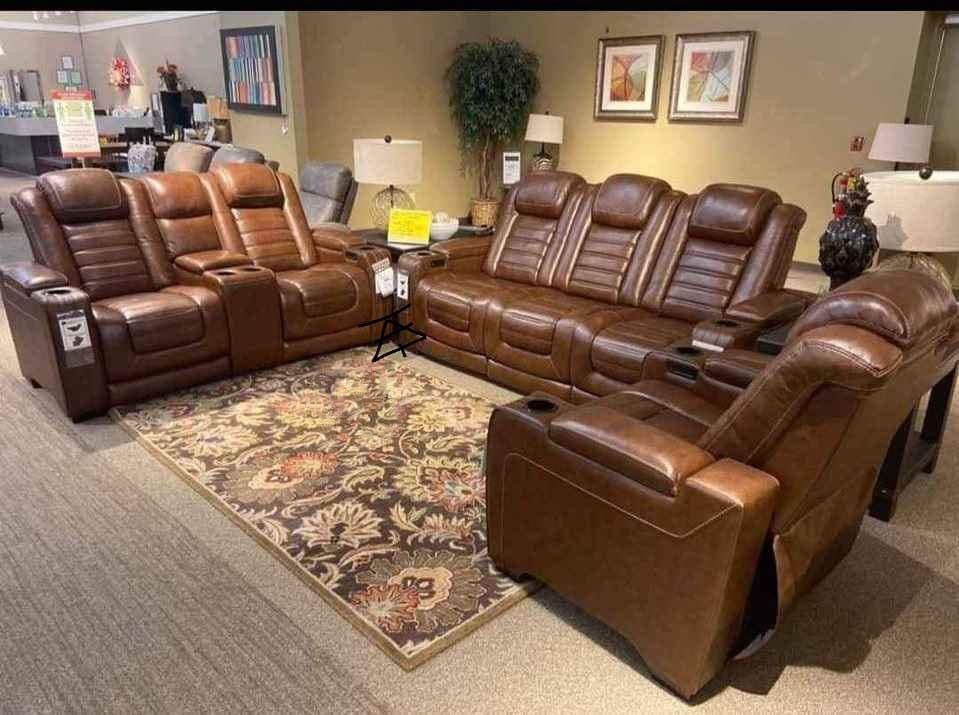 The Man-Den Gray Power Reclining Sofa And Loveseat
Ashley Furniture