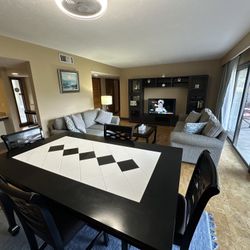 Counter Height Dining Room in Black Table with White/Black Inlay and 6 Chairs. 