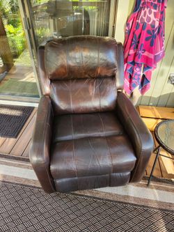 2 leather recliners, electric, wall huggers.