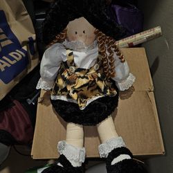 Weighted Cheetah Girl Doll Sits Upright 