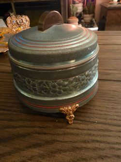 Antique makeup powder music box