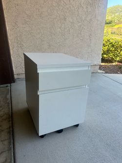 White storage drawers
