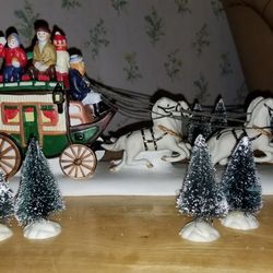 Christmas Carriage Holding Family