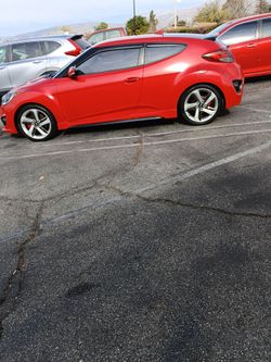 Spoiler adapter for a 2015 Veloster