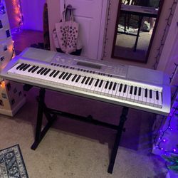 Electric Keyboard (Casio WK-210) with Stand and Power Cord