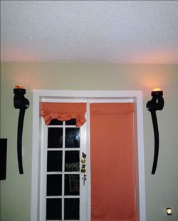 Two Large heavy metal/iron wall sconces-- wall art