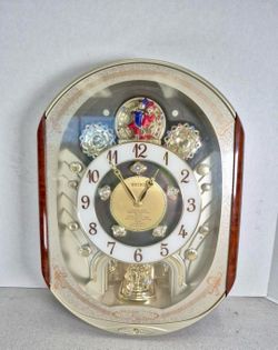 Seiko Melodies in Motion QXM153BRH Musical Animated Wall Clock