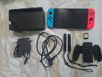 Nintendo Switch OLED + 256GB SD + Games (FIFA/FC)