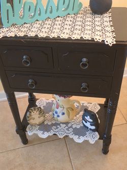 Accent table. 3 drawers. Good condition but stain on the top. $18.