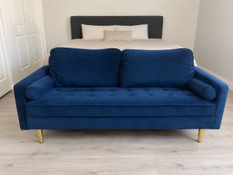 Blue sofa about 5 feet long