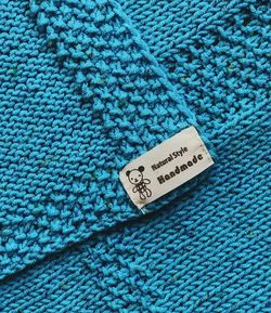 Handmade baby blanket, knitted. Turquoise color. Suitable for a child from birth to two years.