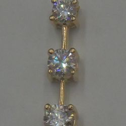 14kt yellow gold pendant 2 grams with 3 diamonds PAST PRESENT FUTURE. 1st diamond 4.7x3mm ; 2nd 4.4x2.7mm ; 3rd 3.8x2.4mm.886458-3.