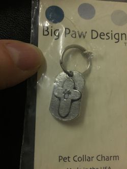Charm with paw print