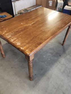 Wood Dining room table with under table leaf