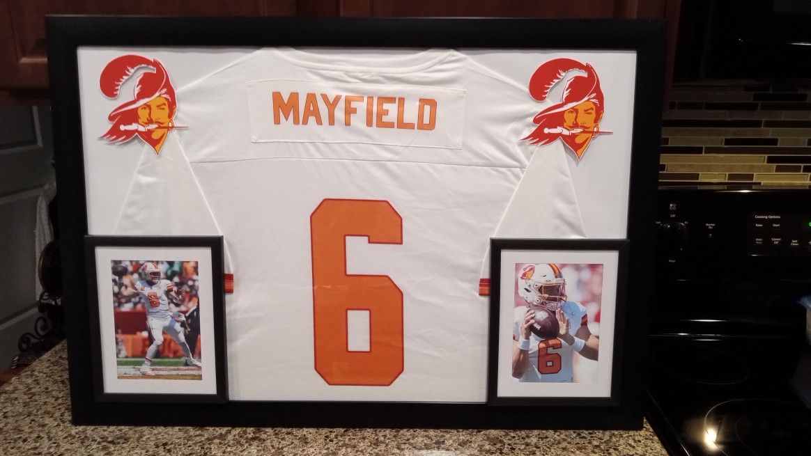 BAKER MAYFIELD OF THE TAMPA BAY BUCCANEERS, FRAMED THROWBACK JERSEY.