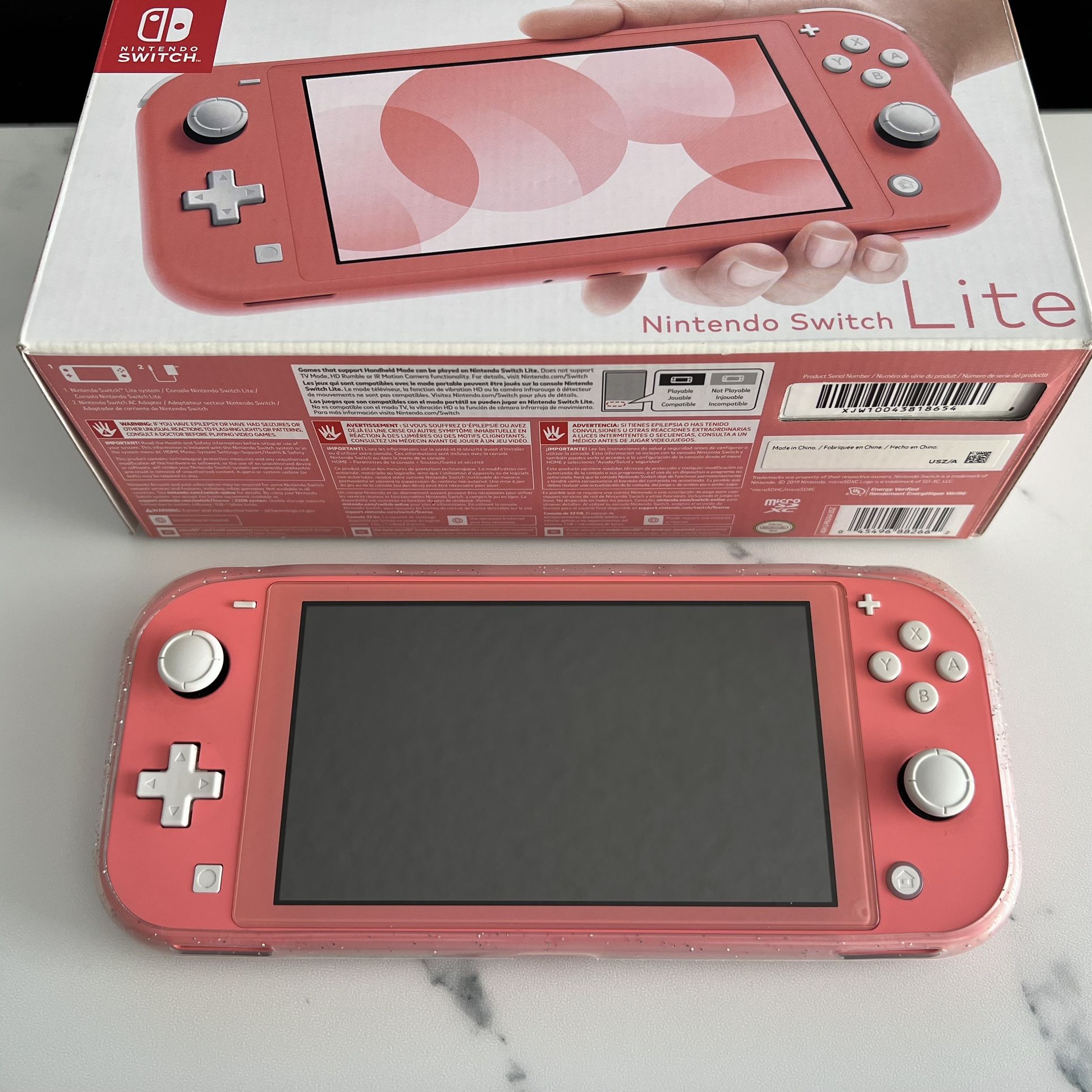 Nintendo Switch Lite (Coral) $140 OBO