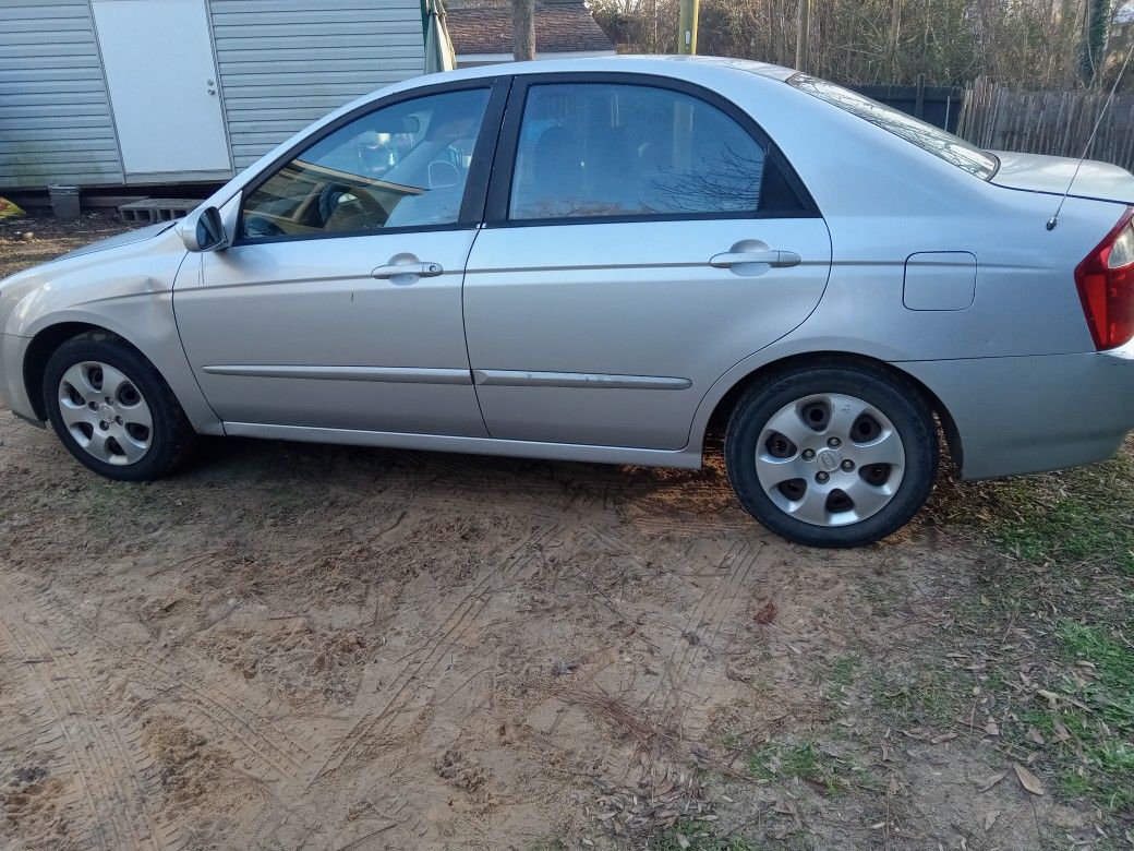2006 Kia Spectra Cash Only Runs And Drives Has Alarm With Remote Has Heat And Air As Is Clean And Clear Title Miles 240648