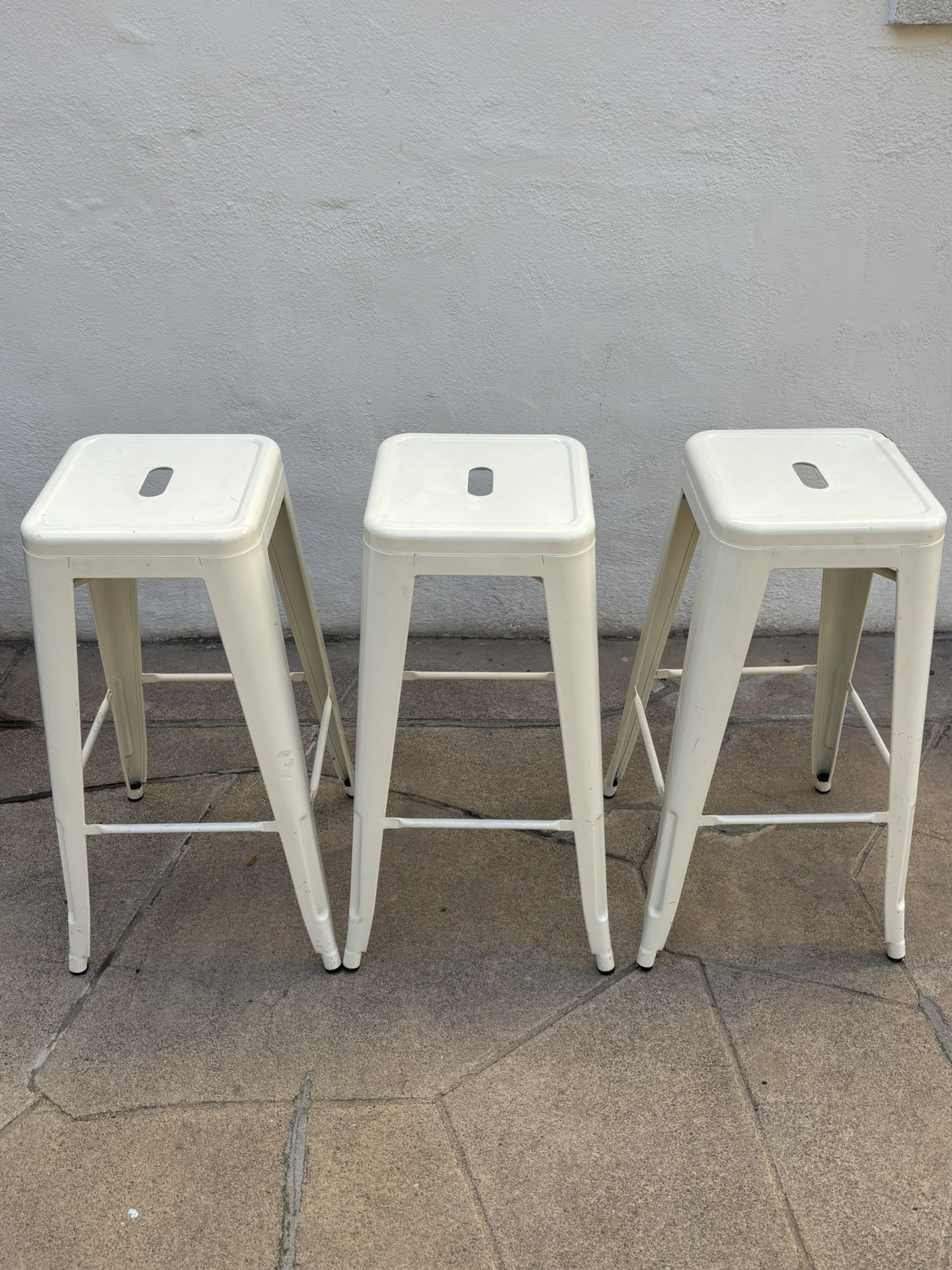 Three Tolix style barstools- White