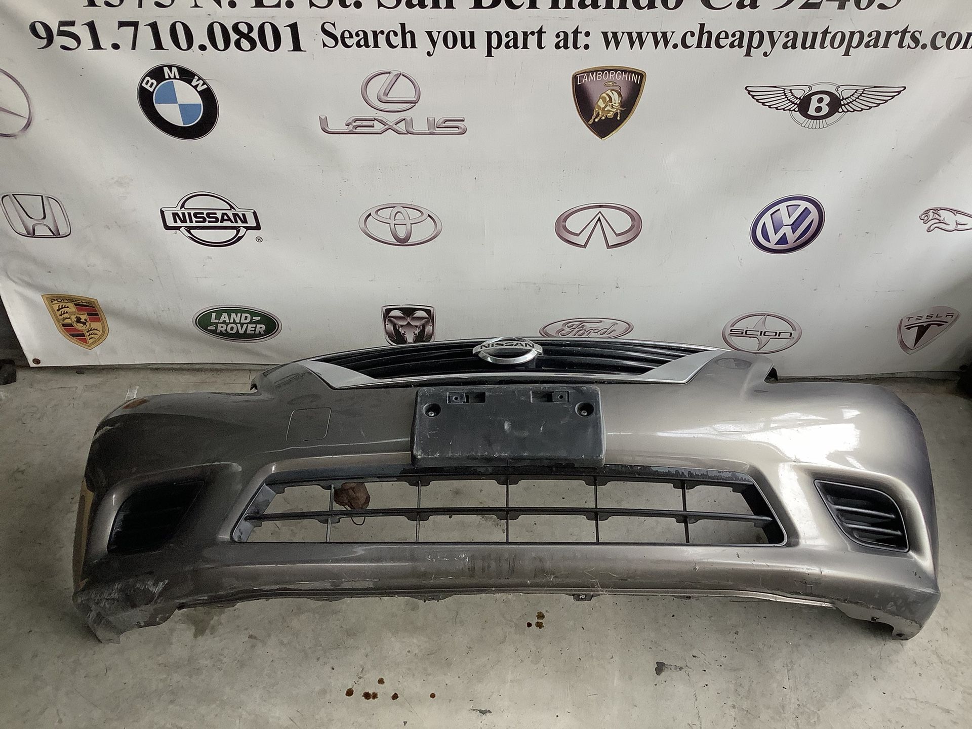 2013-2015 Nissan Versa Sedan Front Bumper OEM