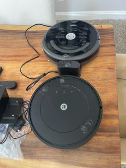 lot of two roomba robot vacuum