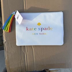 Kate Spade || Rainbow logo large tassel pouch NWT/NEW