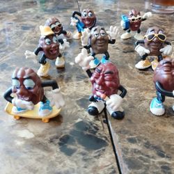 
Vtg Lot 9California Raisins PVC Figures Band Skate Surf 1980's Calrab Applause

This vintage lot includes 9 California Raisins PVC figures from the 1