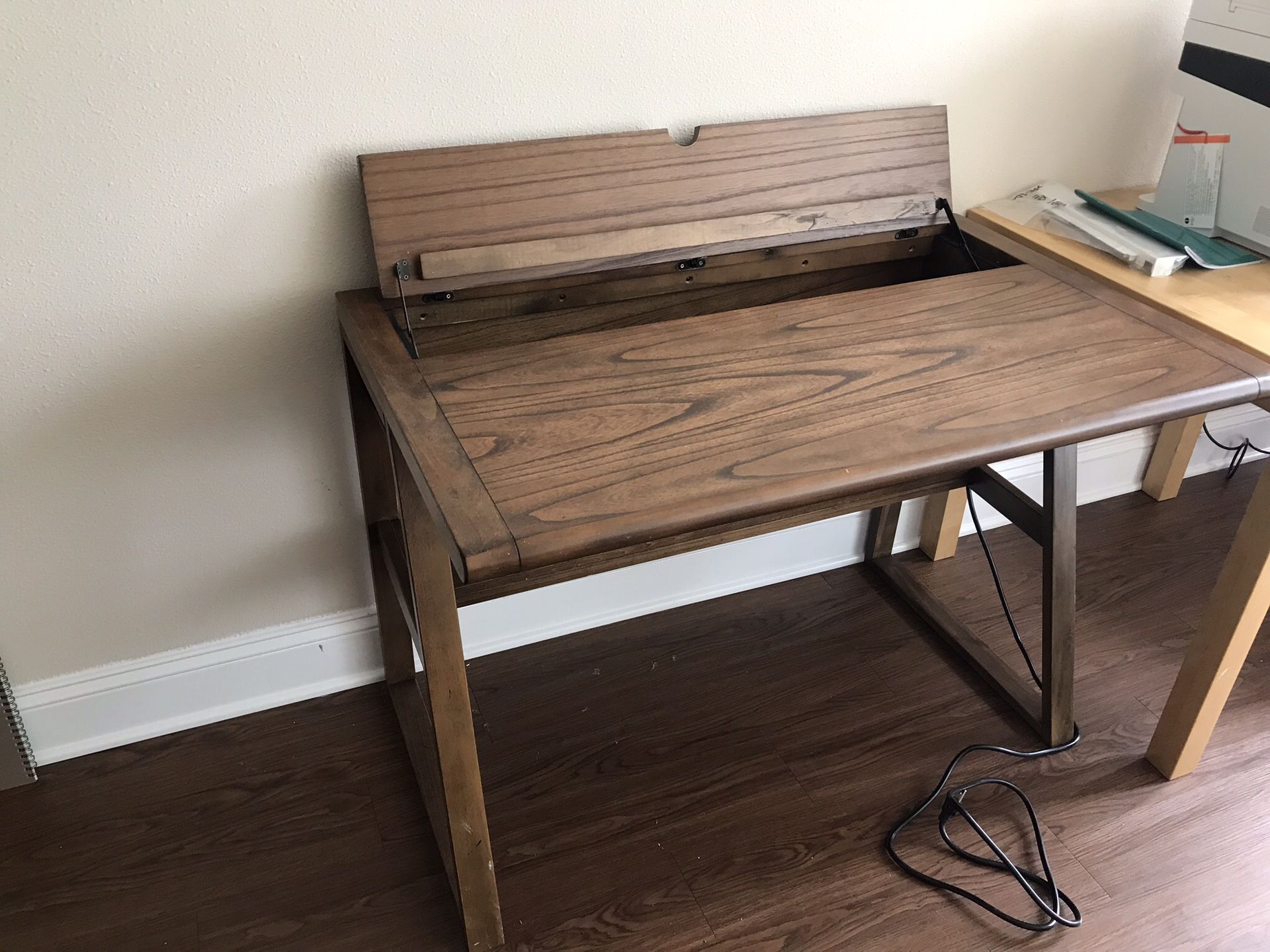 Wood desk with flip open storage and built in outlets