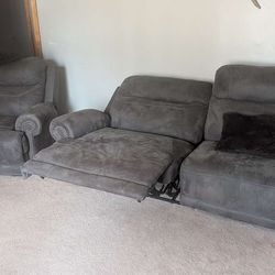 Ashley Furniture Dark Gray Powered Reclining Chair and a Half  + Matching Powered Couch (Wall Hugging)