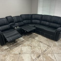 New Power 3 Reclining Sectional.  Black Leather.  116x104x41H.  Free Delivery!