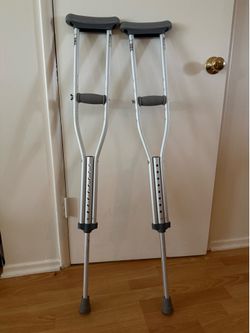 Adjustable crutches