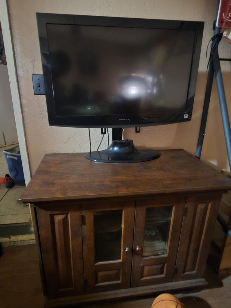 Tv Comb,with Cabinet, DVD Player, And Both Remotes..and Movie Storage Shelfs Both Sides