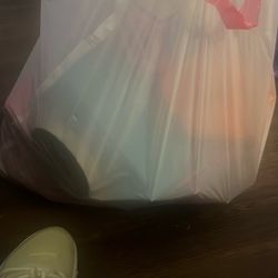bag of Barbie furniture and accesories