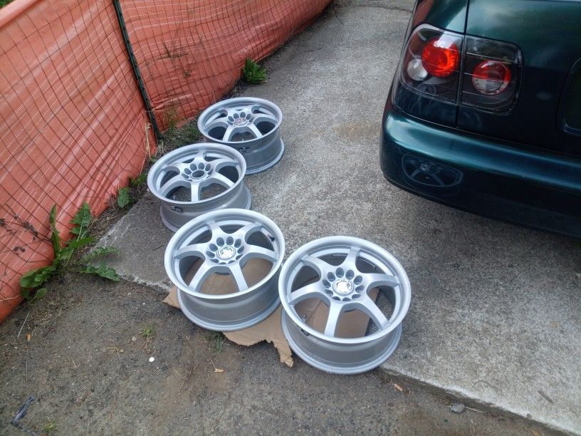 5 Lug Universal Raceline 16 X 7 Rims. I'll Trade For a Same Condition 1997 Honda Civic Ex Rims And Tires. These Also Have Tire If You Need Them Also.