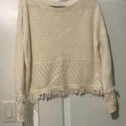 Cream Fate knit sweater with tassels on arms and waist detail size medium